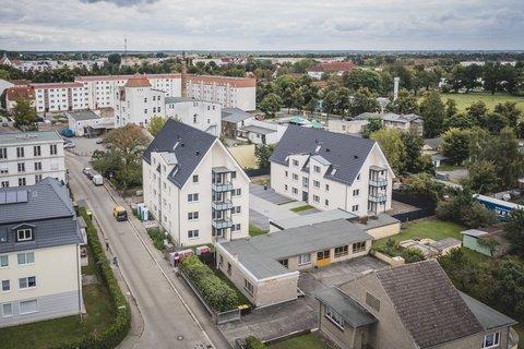 Drohnenaufnahme der EnergieAutarken Mehrfamilienhäuser in Oranienburg Drohnenaufnahme der EnergieAutarken Mehrfamilienhäuser in Oranienburg